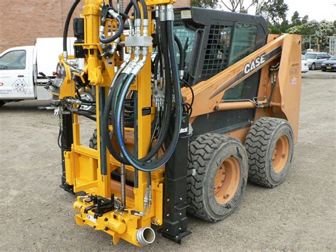 skid steer drilling mast|skid steer well drilling attachment.